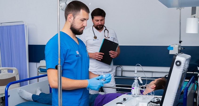 Doctor and patient during blood ozonation therapy at MedTiM Clinic