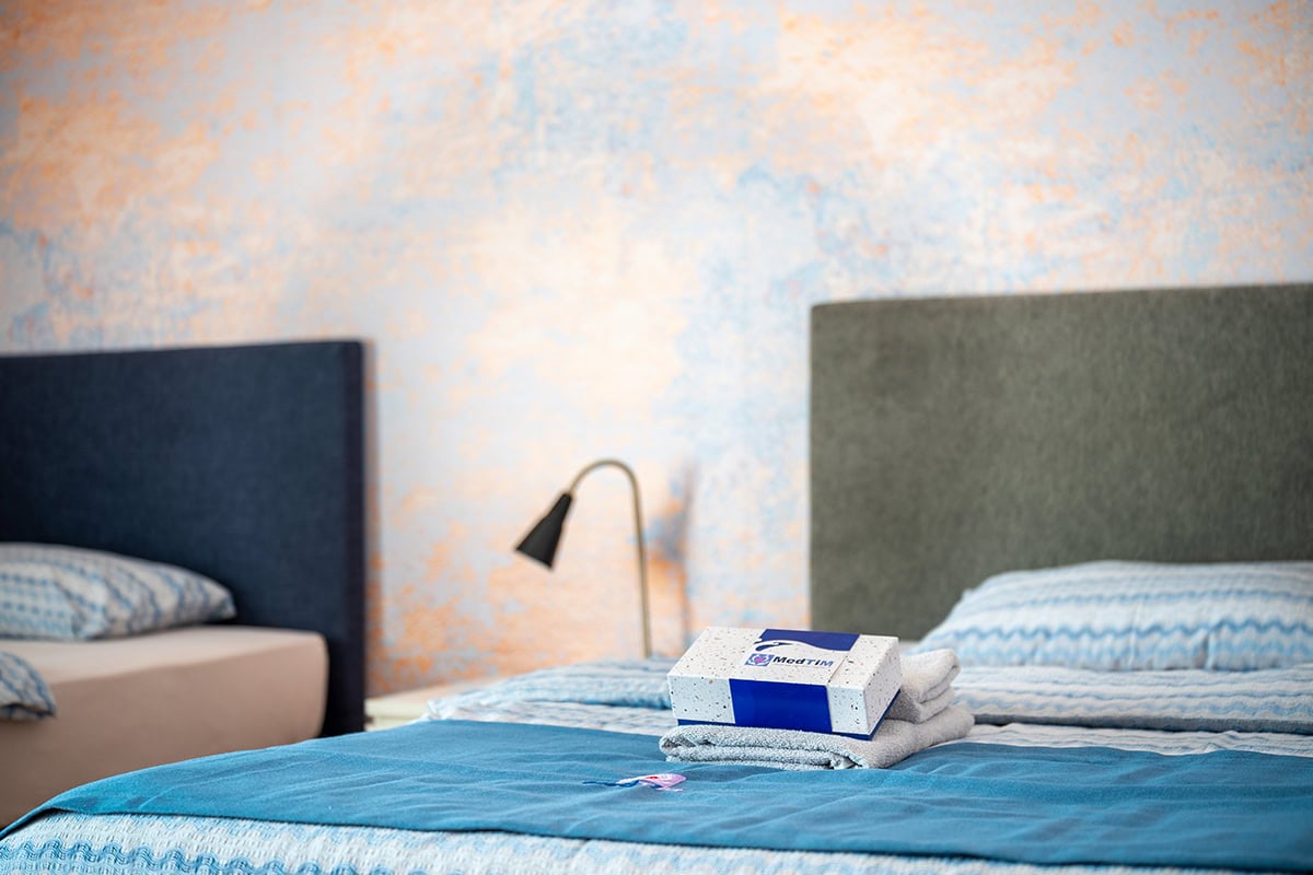 Comfortable Twin Room Comfortable twin room at MedTiM Hospital for patient accommodation during treatment
