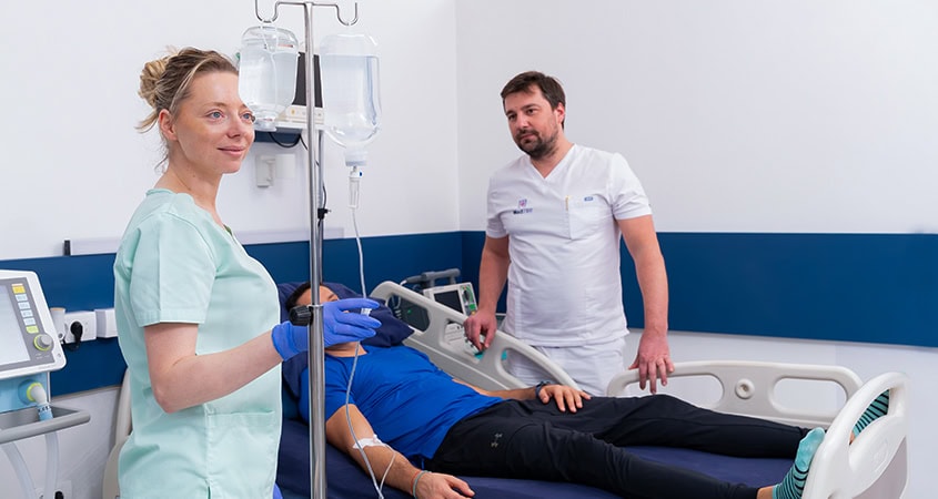 Hepatometabolic Therapy Consultation Doctor and patient during hepatometabolic therapy consultation at MedTiM Clinic