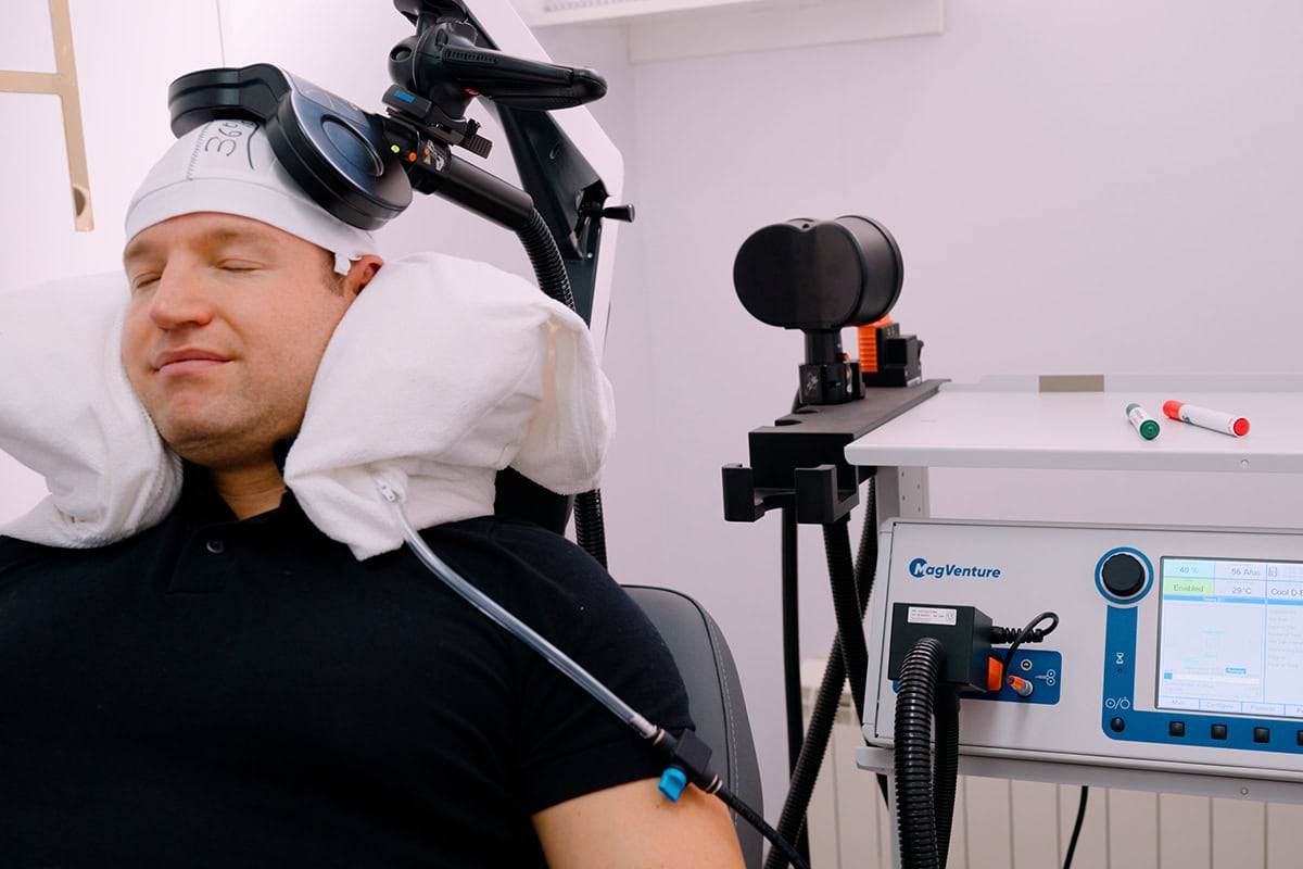 TMS Therapy Patient Patient during TMS therapy at MedTiM Clinic