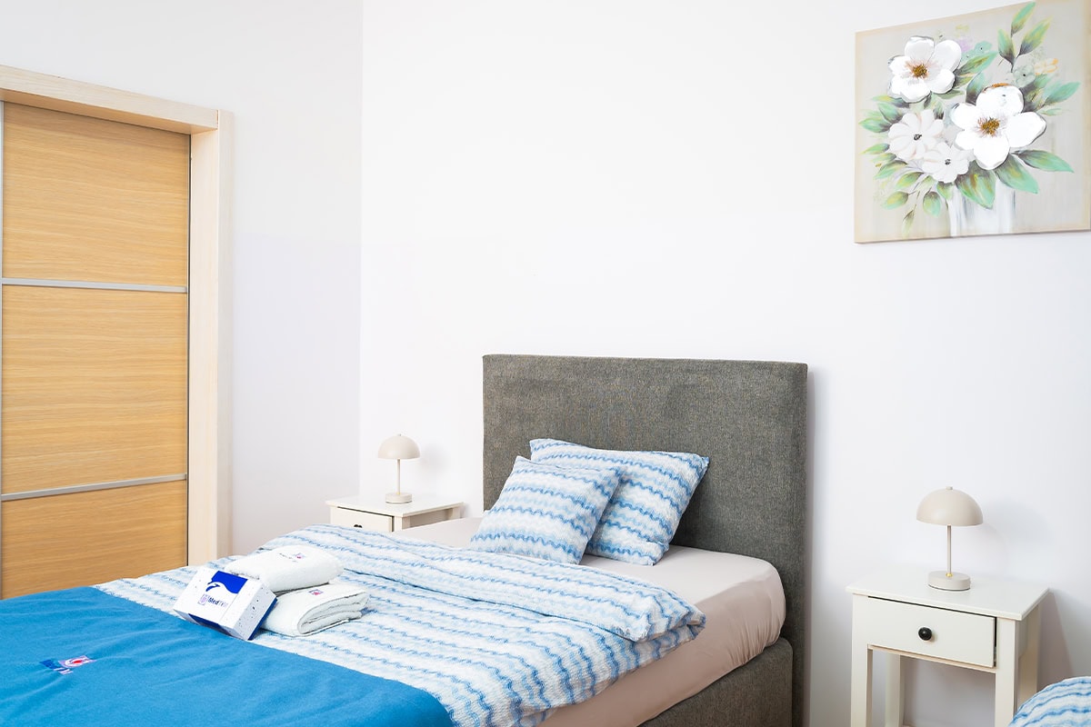 Standard Double Room Standard double room at MedTiM Hospital with two beds for patient accommodation