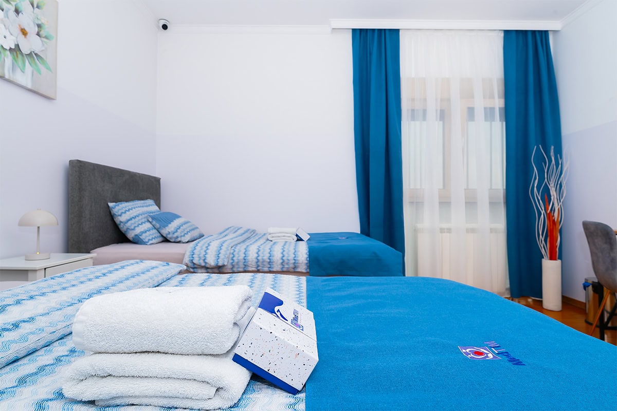 Standard Double Room Standard double room at MedTiM Clinic with two beds and patient amenities