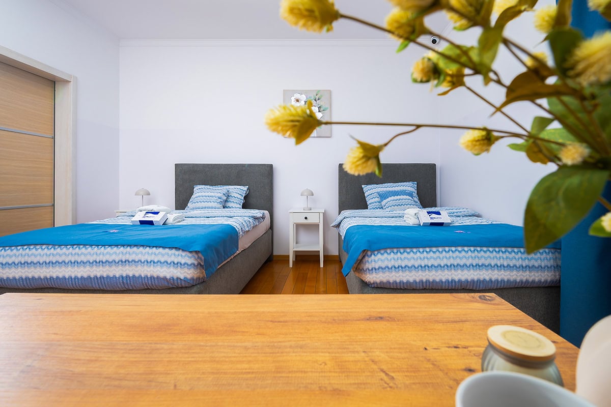 Standard double room with two beds for patients during treatment